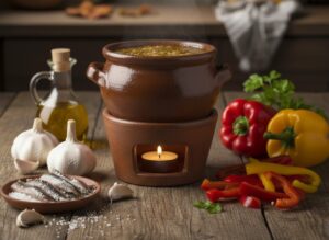 Bagnacauda Immagine: Fujot con bagna càuda fumante, circondato da aglio, acciughe sotto sale e peperoni, che racconta la storia degli acciugai piemontesi.